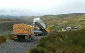 Tarmac trucks delivering the lime.