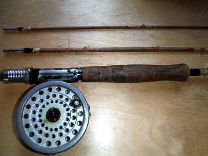 The little fly rod, now retired to Oliver's study wall