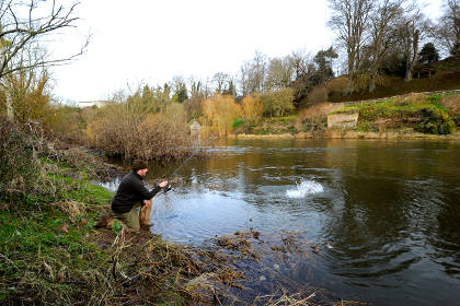 Adam fighting a good pike on the middle reaches of the Wye in January