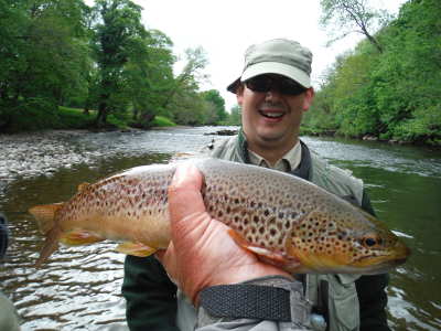 James Snelling with Usk brown trout caught on a small Iron Blue Parachute