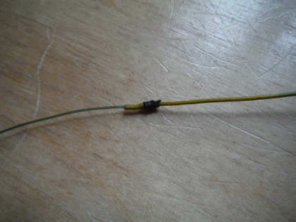 Needle knot between leader butt and fly line