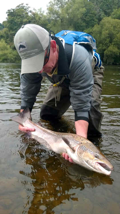 Chris Forsyth with a 15lb salmon he caught on a Cascade from the Ty-Newydd beat of the upper Wye on the 16th July. Photo: Russell Davies