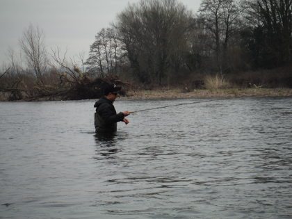 Malcolm Burch braving the weather to fish spiders on the Usk