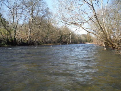 The upper Usk running full in March