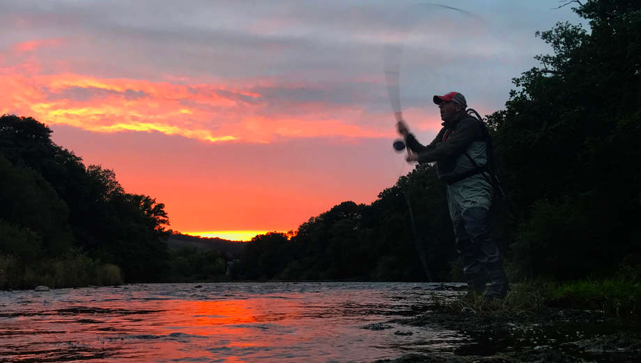 Tim Hughes having an evening cast in the Glangwye Pool of The Rectory