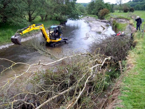 2014 - WUF staff installing a revetment in the Ithon to prevent erosion and restore fish habitat.